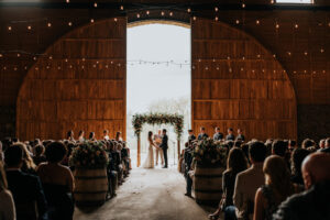 Bride and groom during wedding ceremony at Maysara Winery wedding venue in McMinnville, Oregon.